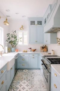 Weather-beaten antique blue cabinets, showcasing a rustic charm and vintage appeal. The distressed finish adds character, making the kitchen feel warm and inviting.