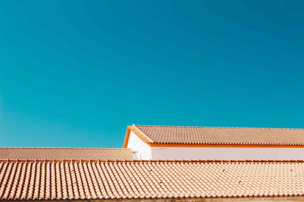 Eco-friendly roofing materials on a modern Suwanee building showcasing sustainable architecture.